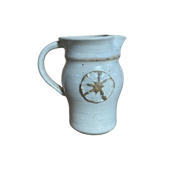 Small Pottery Pitcher with handle. 5" tall. Sand dollar? Signed. - Picture 1 of 4